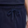 Pantaloni Shiny a gamba larga